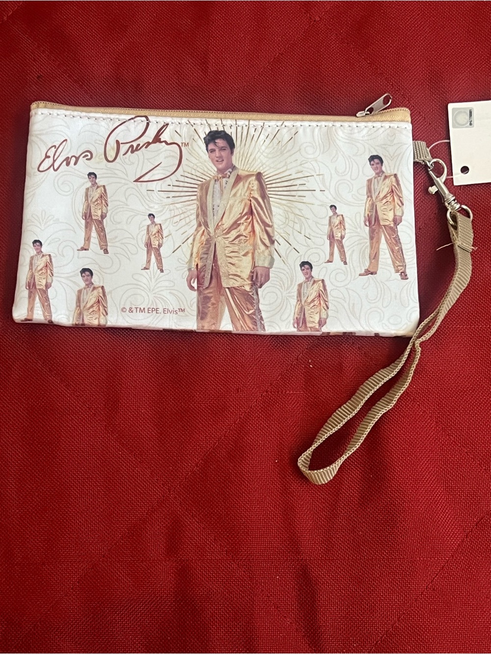 Elvis Presley Gold Lamé Wristlet. A pattern in his iconic gold lamé suit.